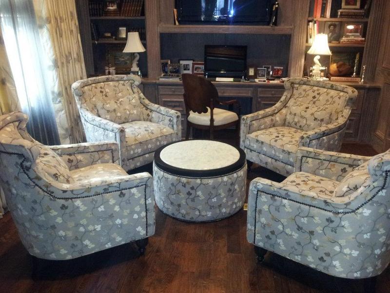 reupholstered set of gray fabric chairs with leaf pattern and ottoman in the middle after photo