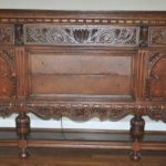 Antique buffet table with intricate wood marquetry
